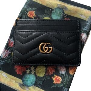 Gucci or Prada Wallet